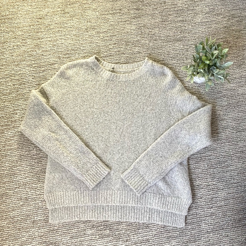 Light grey and white sweater